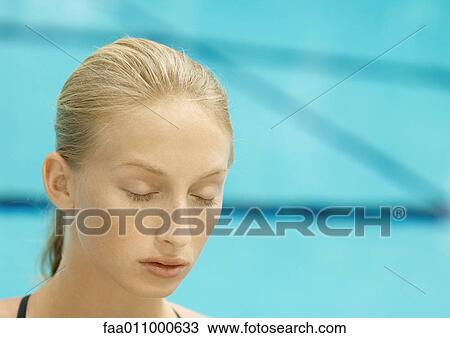 Woman, eyes closed, pool in background View Large Photo Image Stock Image - Woman, eyes closed, pool in background. Fotosearch