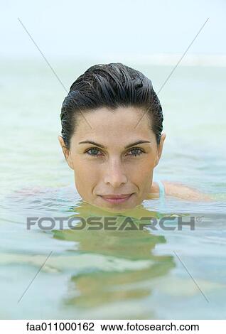 Woman in water, close-up View Large Photo Image Stock Image - Woman in water, close-up. Fotosearch