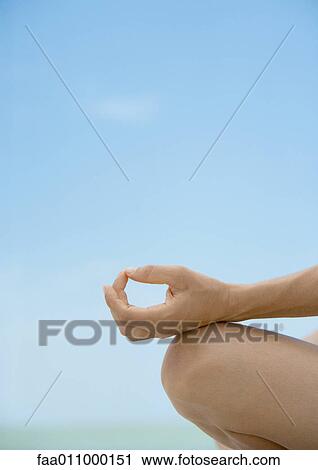 Woman's hand and knee, lotus position, close-up View Large Photo Image Stock Image - Woman's hand and knee, lotus position, close-up. Fotosearch