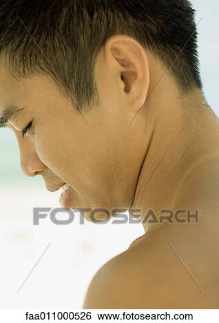 Stock Photograph - Young man, profile. Fotosearch