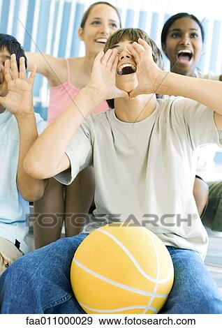 Young teens with basketball shouting View Large Photo Image Stock Photo - Young teens with basketball shouting . Fotosearch