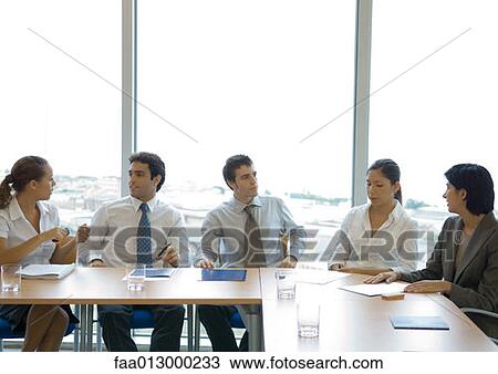 Business colleagues having meeting View Large Photo Image Stock Image - Business colleagues having meeting. Fotosearch