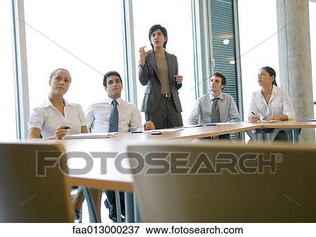 Business colleagues having meeting View Large Photo Image Stock Photo - Business colleagues having meeting. Fotosearch