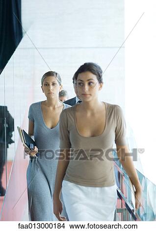 Businesswomen walking toward camera View Large Photo Image Picture - Businesswomen walking toward camera. Fotosearch