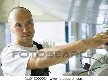 Picture - Factory worker. Fotosearch