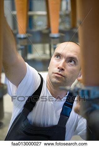 Factory worker View Large Photo Image Stock Photo - Factory worker. Fotosearch