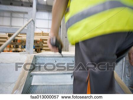 Factory worker View Large Photo Image Stock Photo - Factory worker. Fotosearch