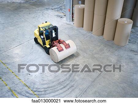 Fork lift picking up roll of paper View Large Photo Image Stock Image - Fork lift picking up roll of paper. Fotosearch