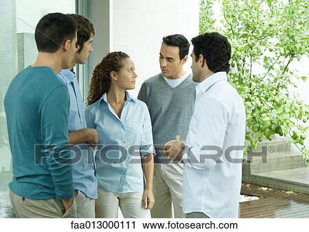 Group of casually dressed adults, standing together View Large Photo Image Stock Image - Group of casually dressed adults, standing together. Fotosearch