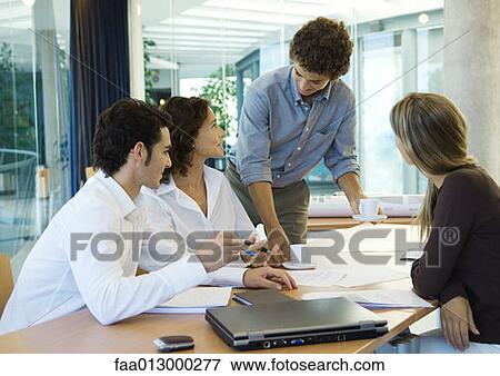 Group of executives working together View Large Photo Image Stock Photo - Group of executives working together. Fotosearch