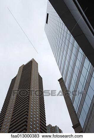 High rise buildings, low angle view View Large Photo Image Stock Image - High rise buildings, low angle view. Fotosearch