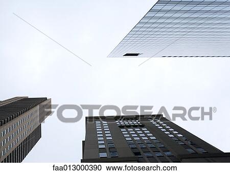 High rise buildings, low angle view View Large Photo Image Stock Image - High rise buildings, low angle view. Fotosearch