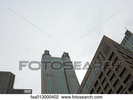 Stock Image - High rise buildings, low angle view. Fotosearch