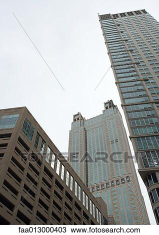 High rise buildings, low angle view View Large Photo Image Stock Image - High rise buildings, low angle view. Fotosearch