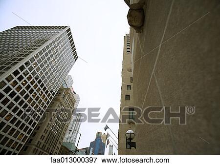 High rise buildings, low angle view View Large Photo Image Stock Photo - High rise buildings, low angle view. Fotosearch