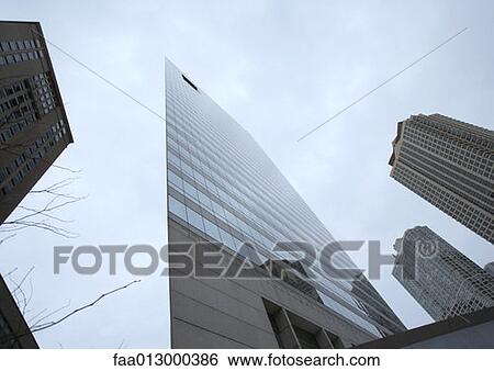 High rise buildings, low angle view View Large Photo Image Stock Photograph - High rise buildings, low angle view. Fotosearch