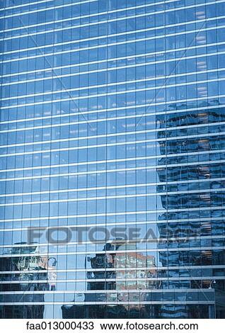 High rises reflected on facade of skyscraper View Large Photo Image Stock Image - High rises reflected on facade of skyscraper. Fotosearch