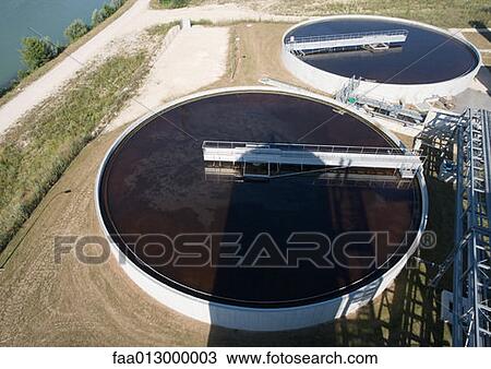 Stock Image - Paper mill, settling tanks. Fotosearch