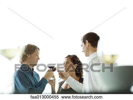Stock Photography - People making a toast with glasses of wine. Fotosearch