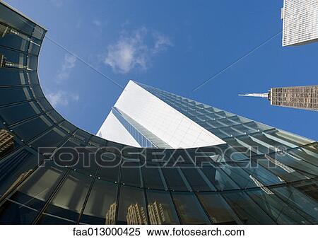 Skyscraper with reflection of buildings on facade, low angle, abstract view View Large Photo Image Stock Photography - Skyscraper with reflection of buildings on facade, low angle, abstract view. Fotosearch