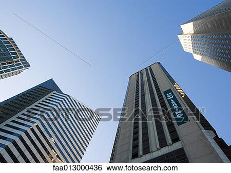 Stock Photograph - Skyscrapers, low angle view. Fotosearch