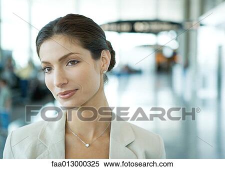 Woman in airport View Large Photo Image Stock Photography - Woman in airport. Fotosearch