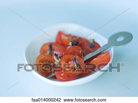 Bowl of sliced tomatoes and cocktail stick View Large Photo Image Stock Image - Bowl of sliced tomatoes and cocktail stick. Fotosearch