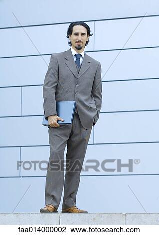 Stock Image - Businessman, full length portrait. Fotosearch