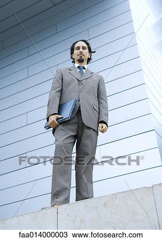 Stock Image - Businessman, full length portrait. Fotosearch