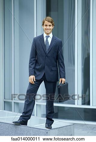 Stock Image - Businessman, full length portrait. Fotosearch