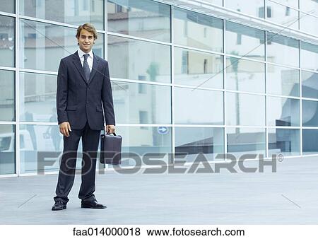 Businessman, full length portrait View Large Photo Image Stock Photo - Businessman, full length portrait. Fotosearch