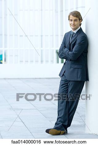 Businessman, full length portrait View Large Photo Image Stock Photograph - Businessman, full length portrait. Fotosearch