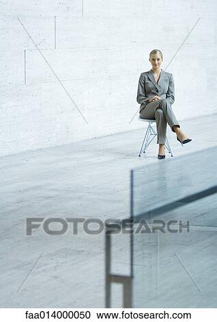 Businesswoman sitting, portrait View Large Photo Image Stock Image - Businesswoman sitting, portrait. Fotosearch