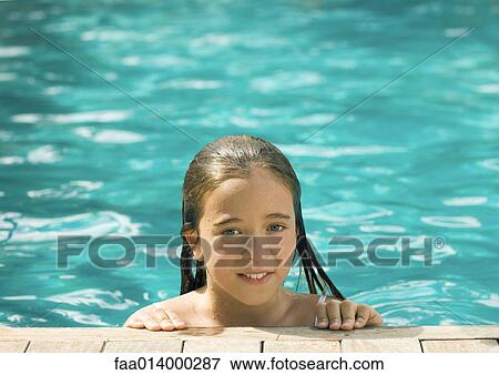 Girl in swimming pool View Large Photo Image Stock Photo - Girl in swimming pool. Fotosearch
