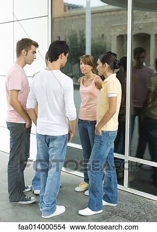 Group of teenagers talking View Large Photo Image Picture - Group of teenagers talking. Fotosearch
