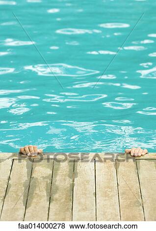 Hands on edge of pool View Large Photo Image Stock Photo - Hands on edge of pool. Fotosearch