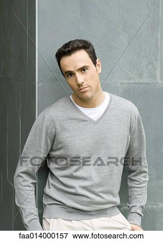 Man looking at camera, waist up, portrait View Large Photo Image Stock Photo - Man looking at camera, waist up, portrait. Fotosearch