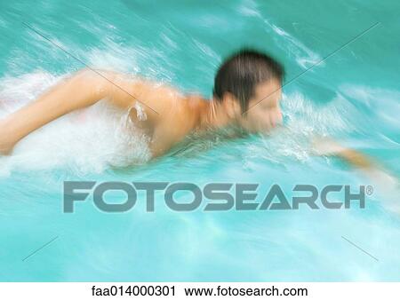Man swimming, blurred motion View Large Photo Image Stock Image - Man swimming, blurred motion. Fotosearch