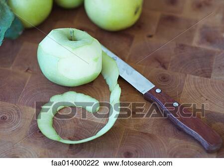 Partially peeled apple View Large Photo Image Stock Image - Partially peeled apple. Fotosearch
