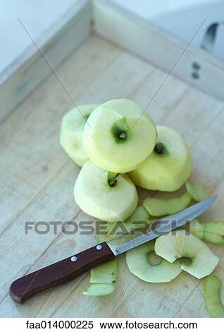 Stock Photography - Peeled apples. Fotosearch