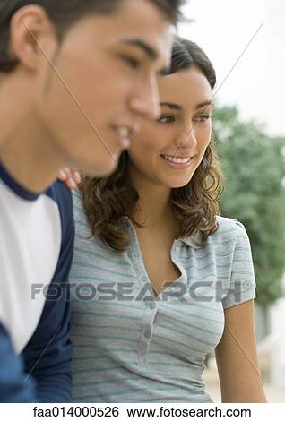 Teenage boy and girl, outdoors View Large Photo Image Stock Photograph - Teenage boy and girl, outdoors. Fotosearch