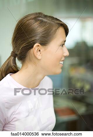 Teenage girl smiling View Large Photo Image Stock Photograph - Teenage girl smiling. Fotosearch