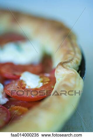 Tomato, goat cheese and ham tart, baked View Large Photo Image Stock Photography - Tomato, goat cheese and ham tart, baked. Fotosearch