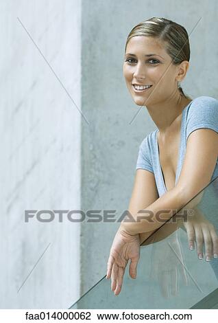 Stock Image - Woman, smiling, portrait. Fotosearch