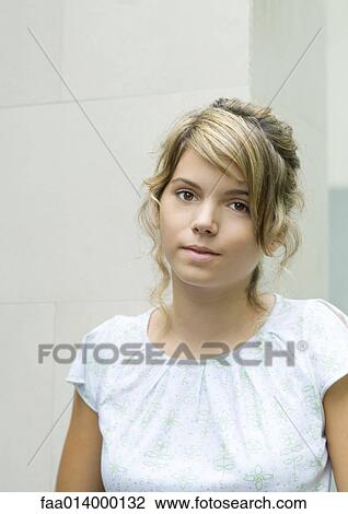 Stock Image - Young woman, portrait. Fotosearch