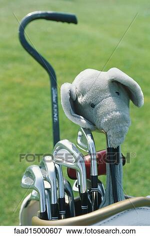 Bag of golf clubs, elephant cover on putter, close-up View Large Photo Image Stock Photo - Bag of golf clubs, elephant cover on putter, close-up. Fotosearch