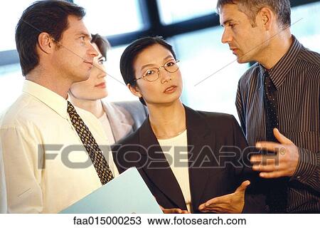 Business associates interacting View Large Photo Image Stock Image - Business associates interacting. Fotosearch