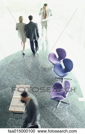 Business executives in lobby, high angle view View Large Photo Image Stock Image - Business executives in lobby, high angle view. Fotosearch