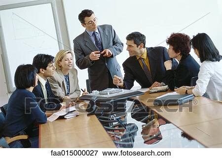 Business meeting in conference room View Large Photo Image Stock Photo - Business meeting in conference room. Fotosearch