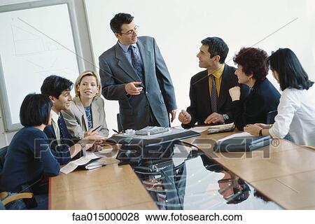 Business meeting in conference room View Large Photo Image Stock Photo - Business meeting in conference room. Fotosearch